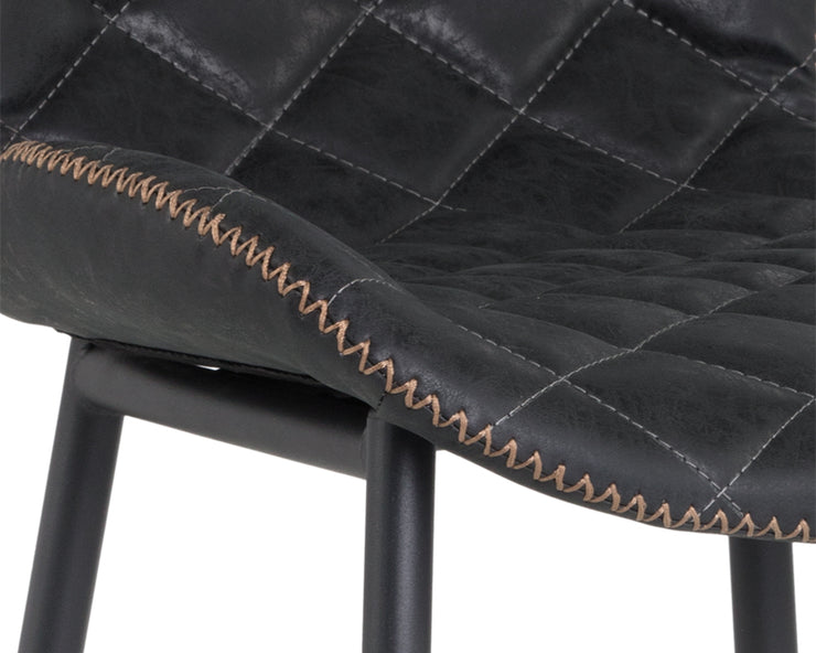 Tabouret moderne avec assise et dossier courbés - capitonnage en losange et coutures en zigzag - plusieurs couleurs disponibles